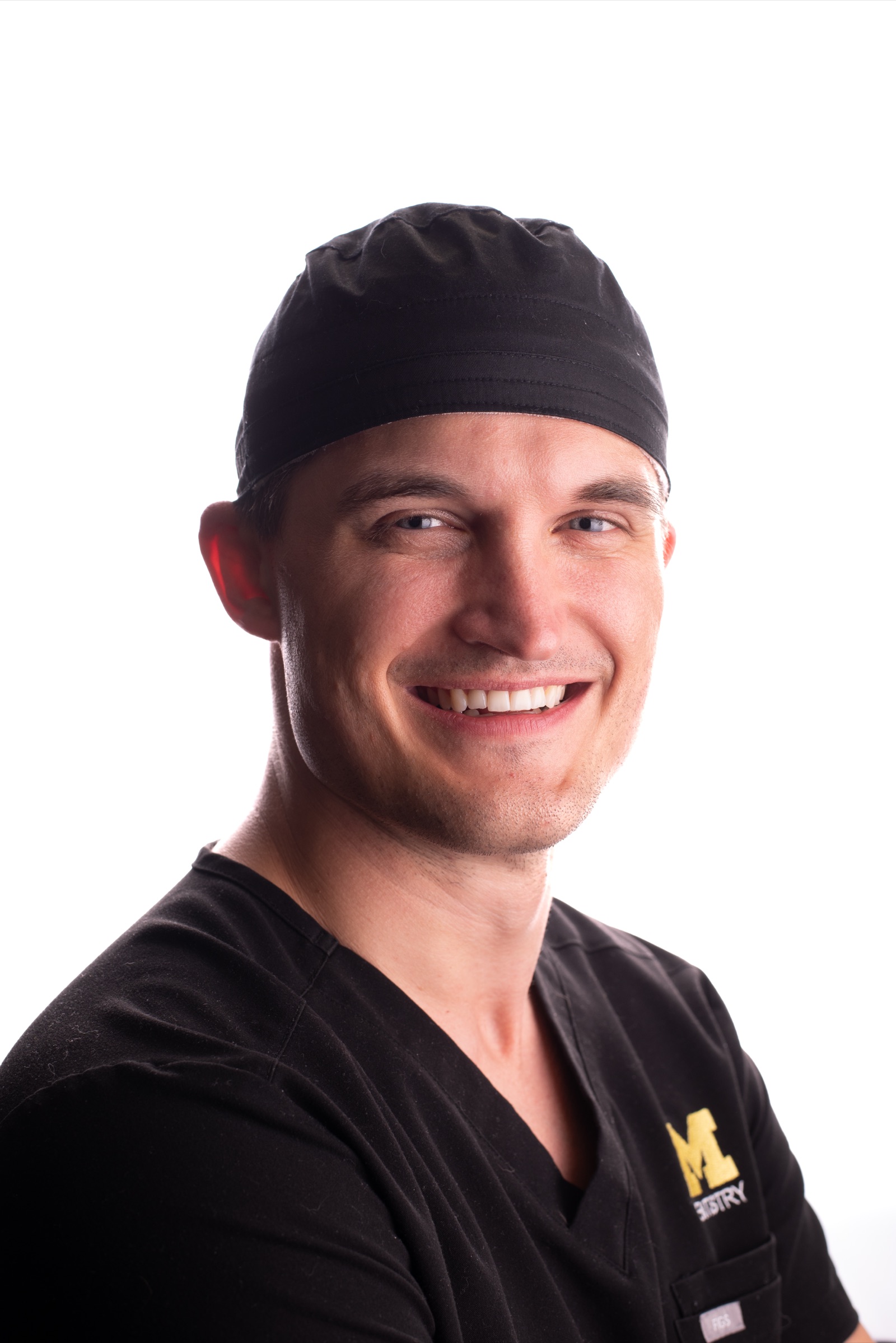 Dr. Misch in surgical attire