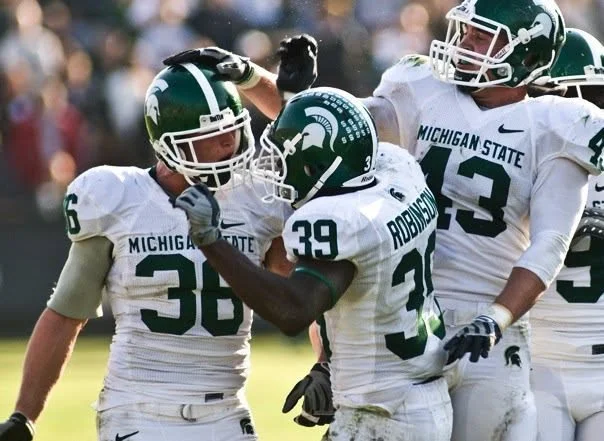 Jonathan Misch on the field for Michigan State football